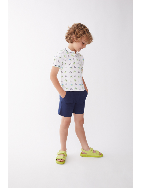 Conjunto Street Monkey 2 piezas: camisa tipo polo manga corta y pantaloneta con bolsas multicolor para niño