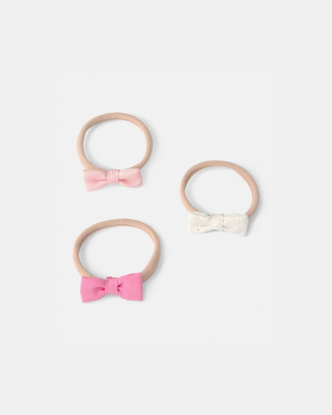 Set de 3 cintas elásticas para cabello de bebé Carter's: rosa claro, blanco texturizado y fucsia.
