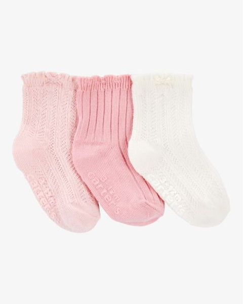 Pack de 3 calcetas Carter's para bebé niña: rosa claro, rosa y blanco, con suelas antideslizantes.