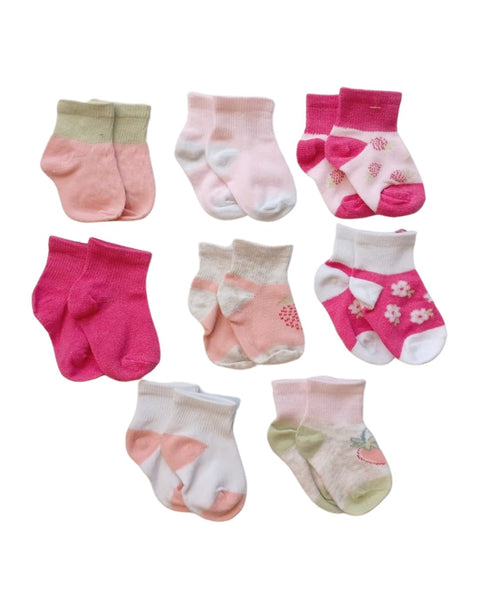 8 pares de calcetas Le Top multicolor para bebé niña, tonos rosa con diseños de flores y puntos.