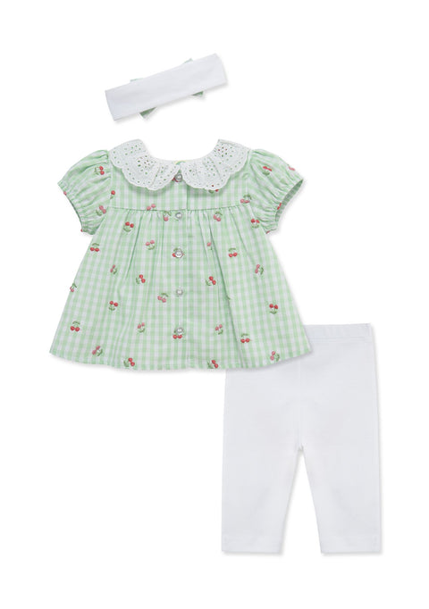 Conjunto Little Me de 3 piezas para niña: túnica de cuadros verdes con cerezas, cuello blanco con encaje, leggings blancos y banda para el cabello.