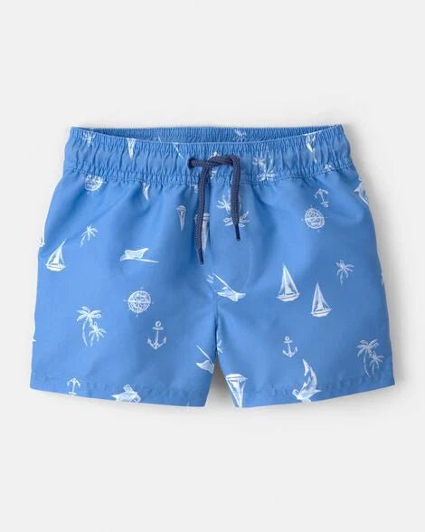 Bañador Carters de niño celeste con estampado marino y pañal incorporado. Vista frontal.