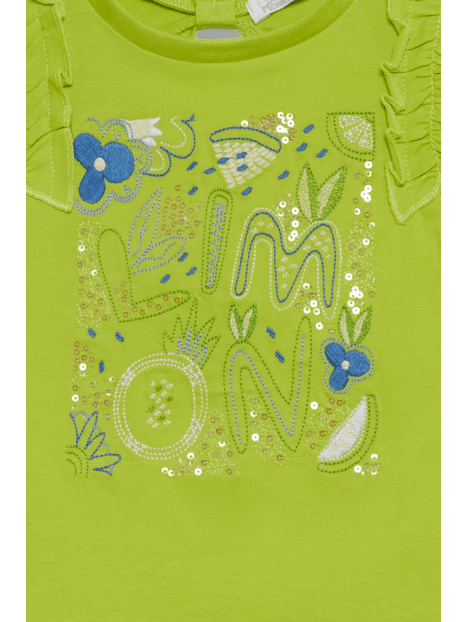 Detalle del diseño "Limon" con lentejuelas y flores en la blusa verde limón para niña Street Monkey.