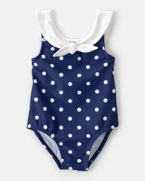 Calzoneta Carters azul marino de puntos blancos con cuello para bebé niña