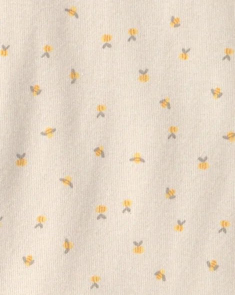 Estampado de abejitas diminutas en body de manga larga Carter's, color crema, suave y cómodo.