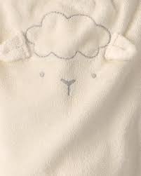 Pantalón de felpa marfil para bebé con diseño de carita de oveja bordada y orejitas en la cintura.