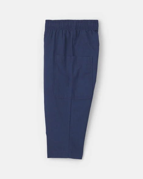 Pantalón largo azul marino Carter's para bebé, vista lateral, con elástico en la cintura y bolsillo.