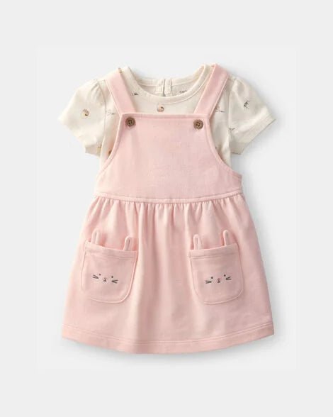 Conjunto Carter's para bebé niña: vestido jumper rosa con conejos y body blanco de manga corta.
