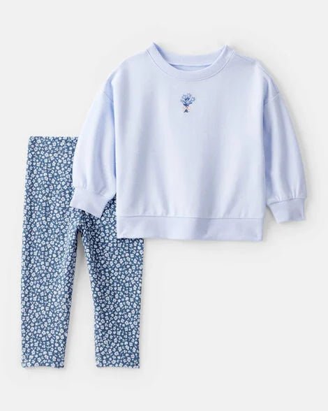 Conjunto Carters 2 piezas niña: sudadero celeste bordado y leggings azul con estampado floral.