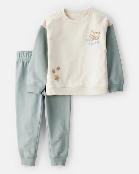 Conjunto Carters para niño: sudadero crema con mangas aguamarina y jogger aguamarina con diseño de tigre.