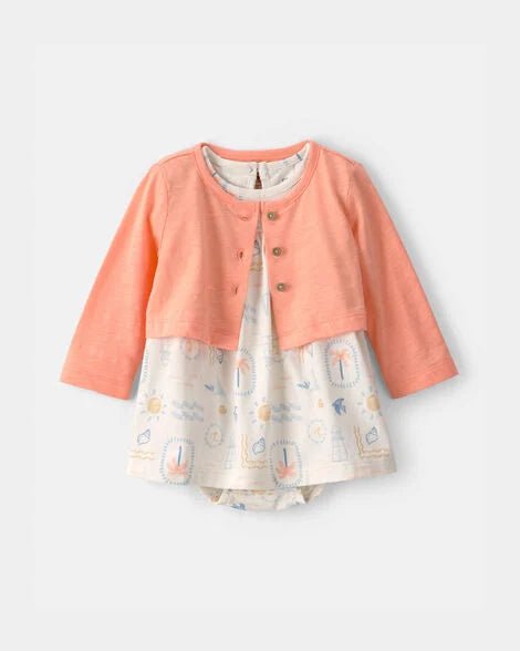 Conjunto Carter's de bebé niña: vestido blanco estampado con torerita coral suave y cómoda.