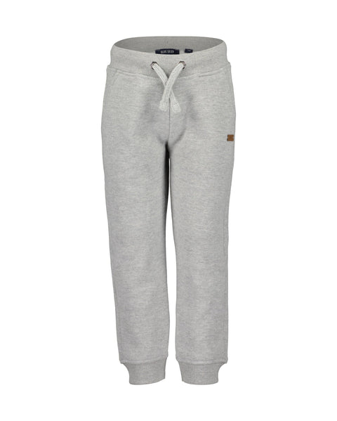 Pantalón jogger gris Blue Seven para niño, vista frontal con cintura elástica y cordón.