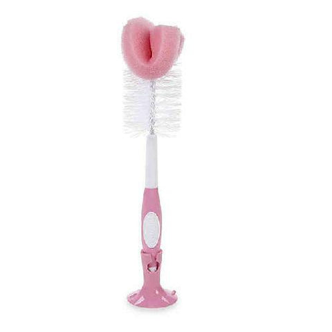 Cepillo para lavar pachas Dr. Brown's color rosado con esponja y base para secar.