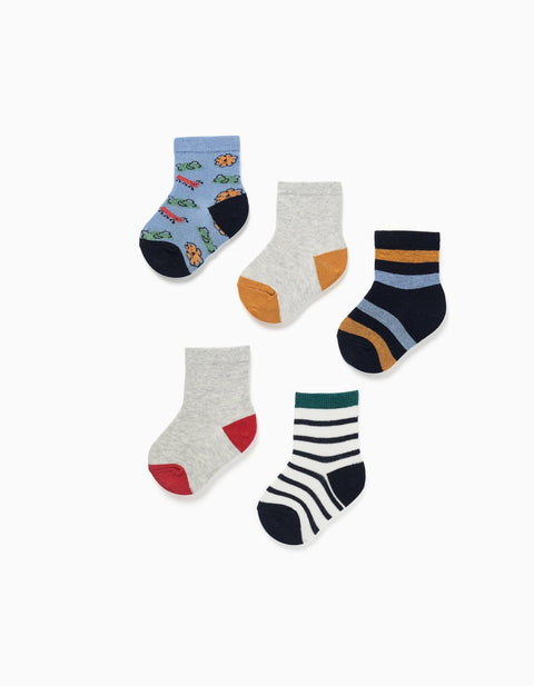 Set de 5 calcetas Zippy para bebé, con patrones de animales y rayas en colores variados.