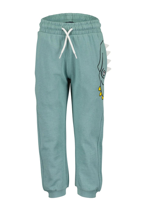 Pantalón jogger de fleece verde Blue Seven con diseño de dinosaurio y cordón blanco para niño.