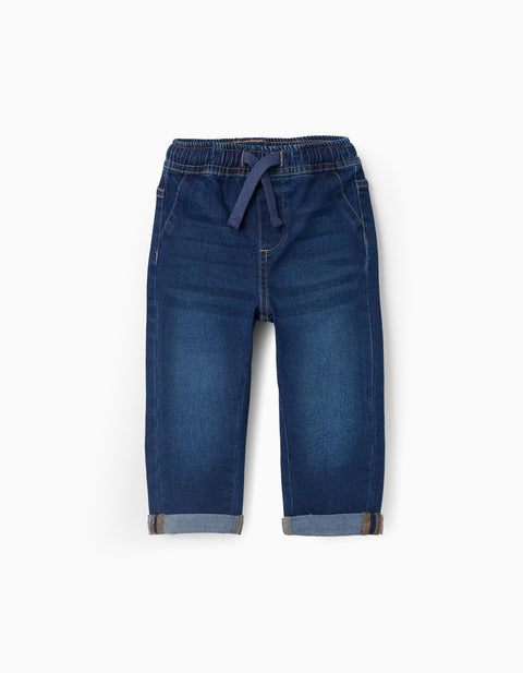Pantalón jogger denim azul Zippy para bebé, vista frontal con cordón decorativo y elástico en