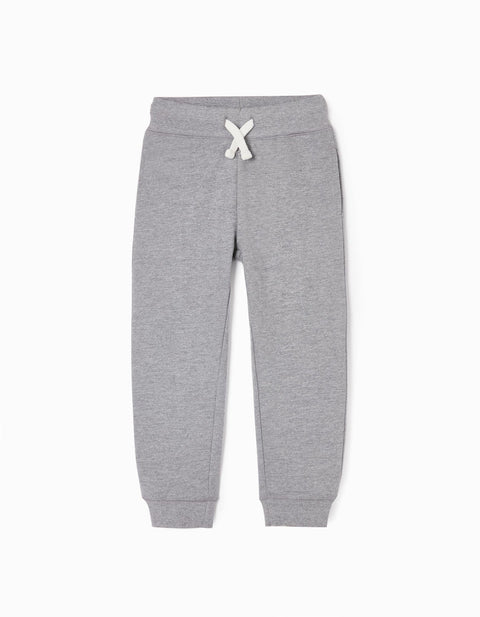 Pantalón de fleece gris Zippy para niño, vista frontal con cordón decorativo blanco, ideal para