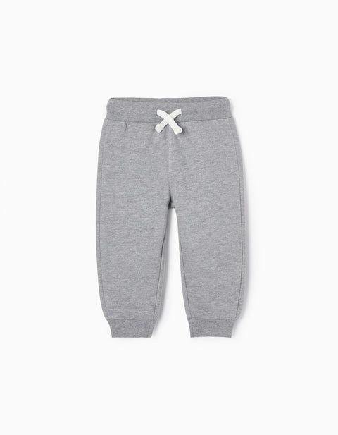 Pants jogger de fleece gris Zippy para bebé, vista frontal con cordón decorativo blanco.