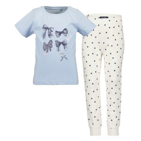 Pijama Blue Seven para niña: blusa celeste manga corta con moños y pantalón blanco con puntos negros.