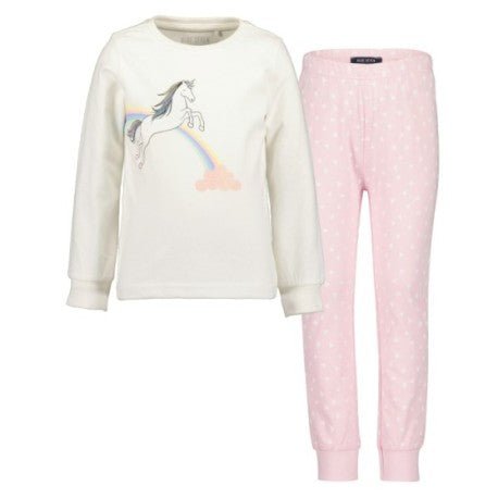Pijama niña Blue Seven: blusa blanca unicornio, arcoíris y pantalón rosa con puntos.