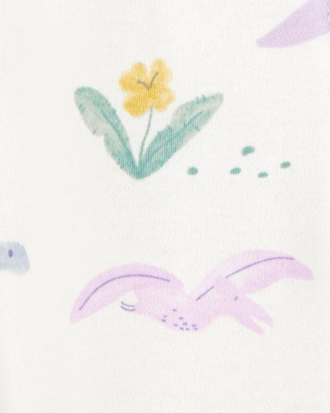 Detalle estampado de pijama Carters: dinosaurio volador pastel y flor amarilla.