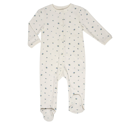 Pijama de bebé con pies Kinder blanca, con estampado de arándanos azules y zipper frontal.