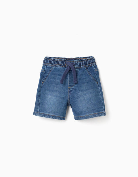 Shorts denim azul para bebé Zippy con cintura elástica y cordón ajustable, vista frontal.