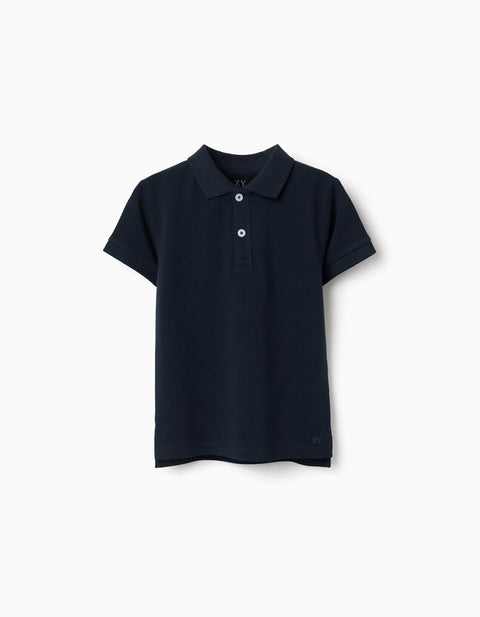 Camisa polo piqué azul marino para niño de Zippy, con botones blancos y cuello, vista frontal.