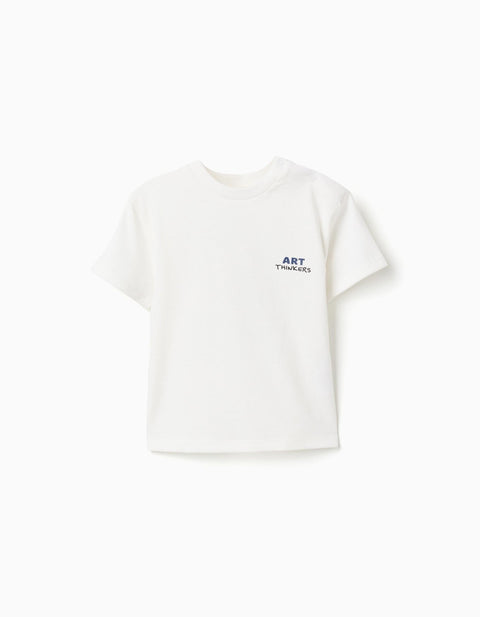 Camiseta blanca de algodón Zippy para bebé con estampado frontal 'ART THINKERS' en azul.