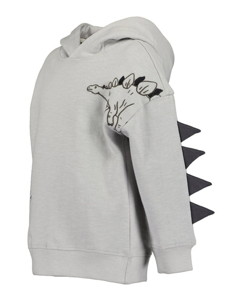 Sudadero gris Blue Seven de niño con diseño de dinosaurio y púas 3D. Vista lateral detallada del hombro.