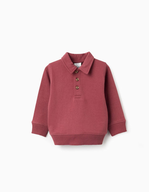 Sudadera Zippy de algodón para bebé en tono terracota, cuello polo y botones, vista frontal.