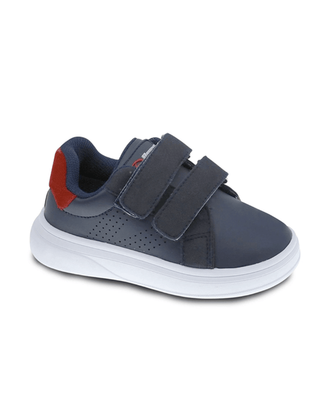Zapato casual Beppi azul marino para niño con velcro, suela blanca antideslizante y detalle rojo.