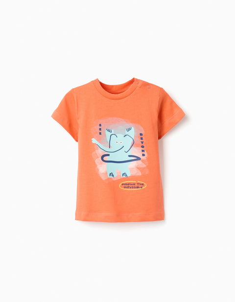 Playera de bebé Zippy naranja con elefante haciendo hula hoop, vista frontal.