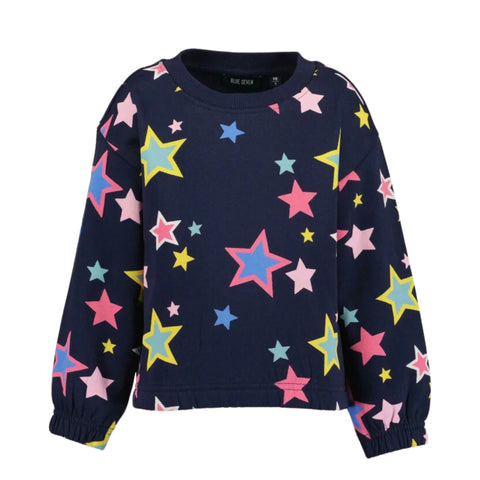 Blusa Blue Seven azul manga larga con diseño de estrellas multicolor para niña.