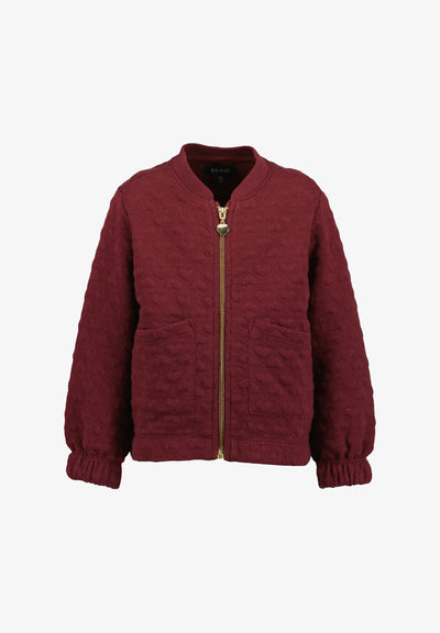 Chumpa Blue Seven con zipper color corinta para niña