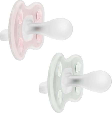 Juego de 2 chupetes Dr. Brown's Advantage de silicona en tonos rosado pastel y verde menta.