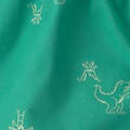 Short verde con estampado de dinosaurios y volcanes para bebé Carter's.