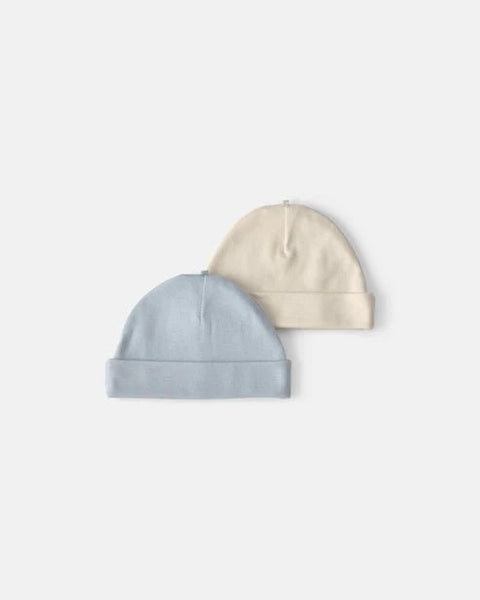 Set de dos gorros para bebé Carter's en colores celeste y crema suave, perfectos para recién nacidos.