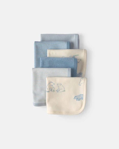 Set de 6 pañitos para bebé Carter's apilados: rayas azules y blancas, azul liso y crema con osos.