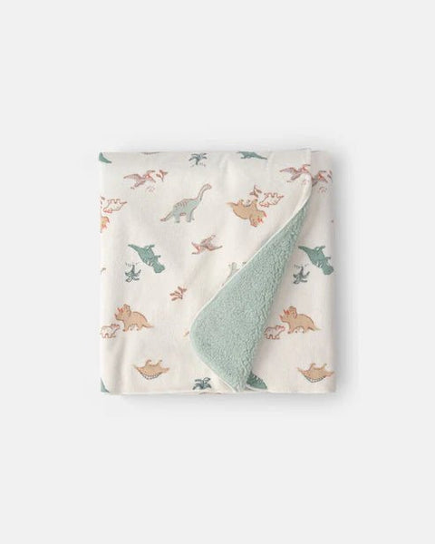 Manta suave de velboa Carter's con estampado de dinosaurios coloridos y forro sherpa verde menta, plegada.