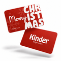 Tarjeta de regalo navideña Kinder Card en rojo con diseño de "Merry Christmas" y un copo de nieve