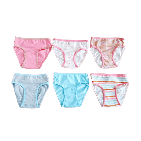 Paquete de 6 calzoncitos para niña con variedad de diseños: rosado, rayas, arcoíris, gris y celeste.