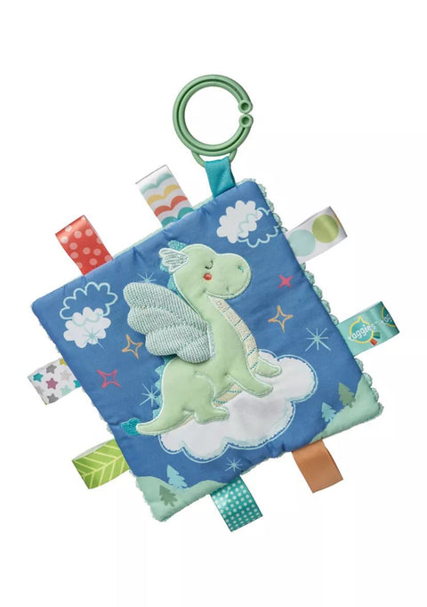 Taggies Crinkle Me Dragón Drax azul con dragón verde, nubes, estrellas y etiquetas sensoriales.